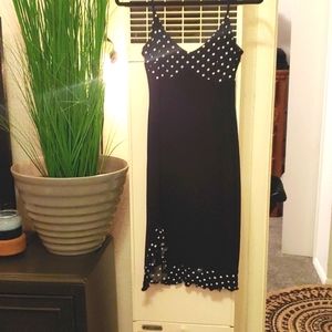 Size 4 black dress w/ white polka dots & frilly hemline